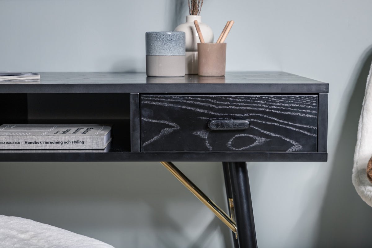 Schreibtisch Aluri - mit schwarzem Furnier und Messingdetails