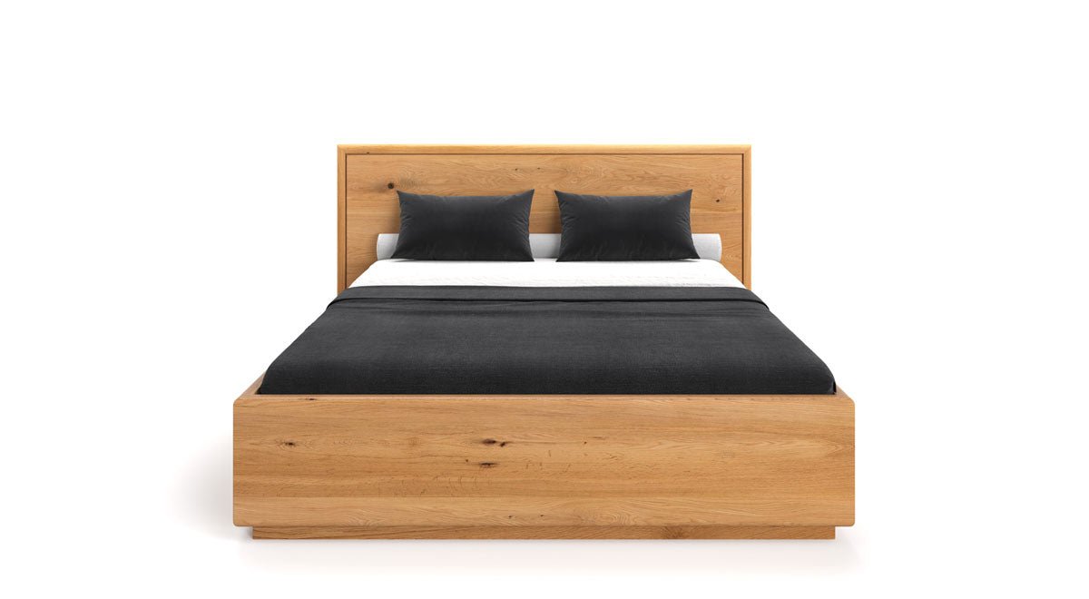 Designer Holzbett Celestia aus massiver Eiche mit Stauraum