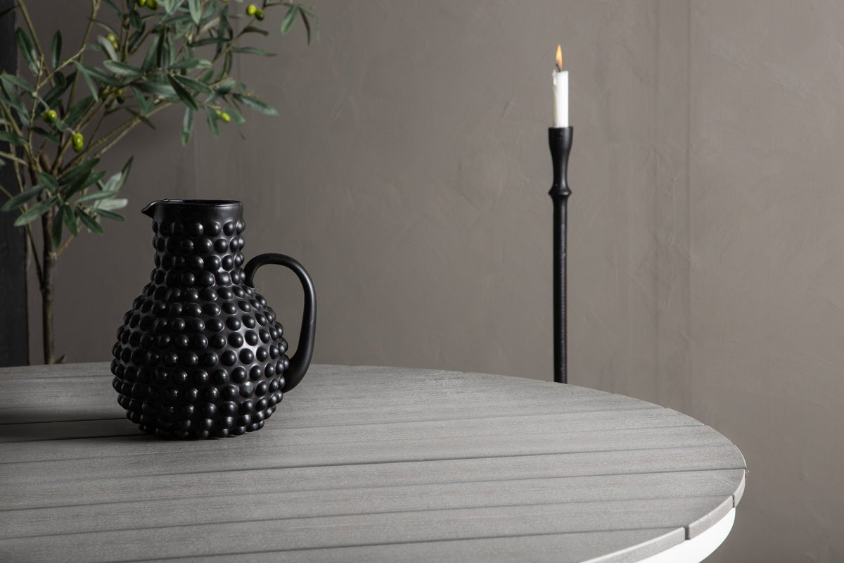 Table de jardin Aviani - ronde, accueillante et élégante