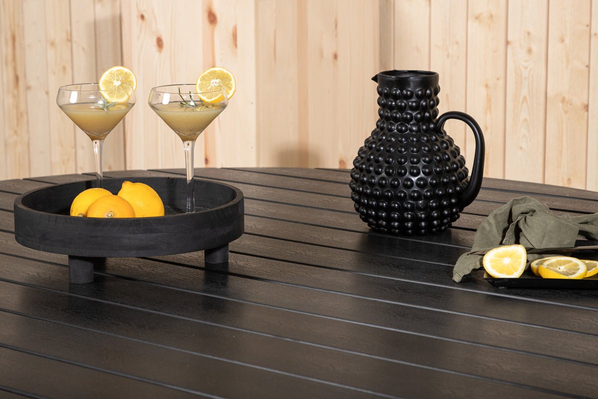 Table de jardin Aviani - ronde, accueillante et élégante