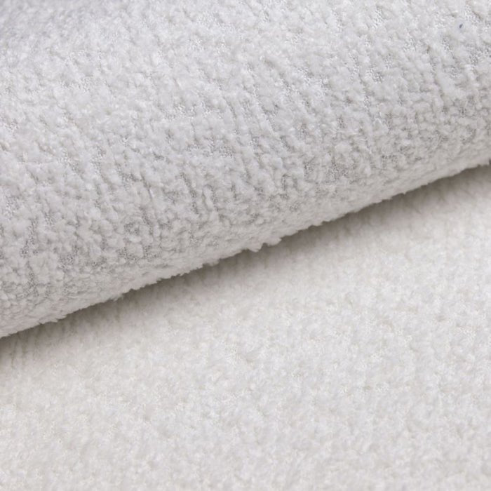 Canapé d'angle modulaire Yuma avec pouf en Bouclé