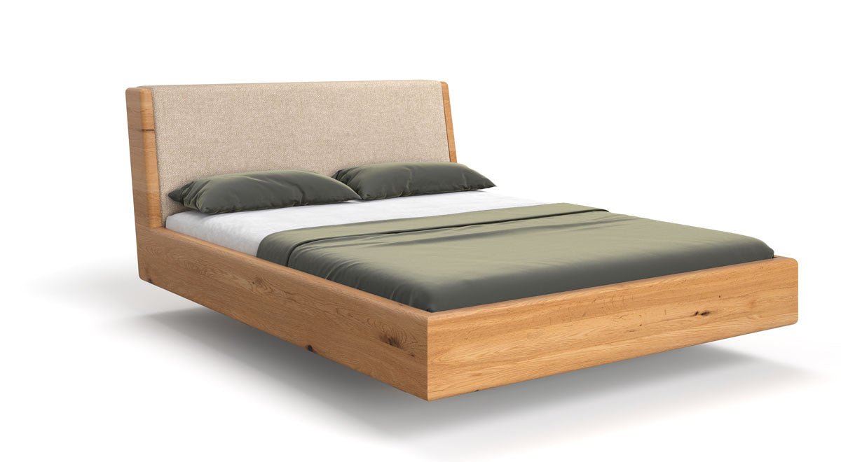 Designer houten bed Cassian van massief eiken in zwevende look
