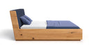 Designer houten bed Cassian van massief eiken met opbergruimte