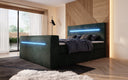 Boxspringbett Sejour mit TV Lift, RGB und Stauraum in Cord