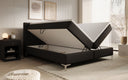 Boxspringbed Leona van kunstleer met opbergruimte