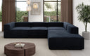 Designer Ecksofa Lesley mit langer Ottomane in Samt