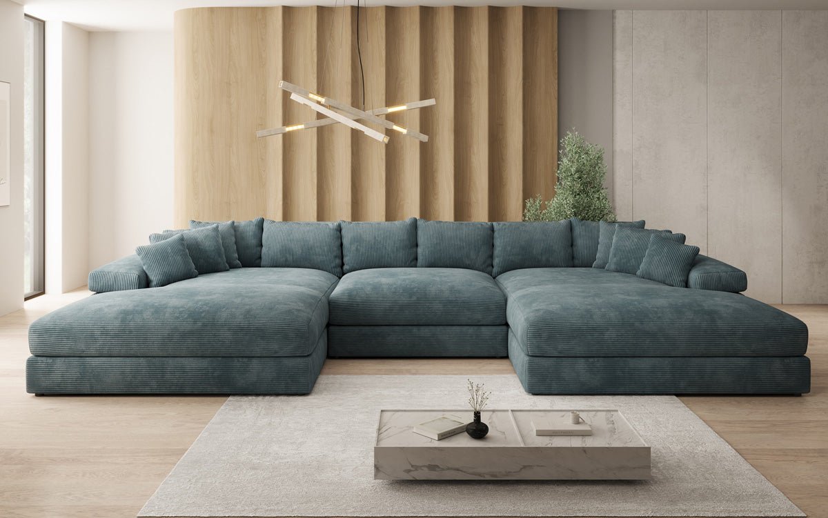 Designersofa Bernardo U met brede ottomane in ribstof