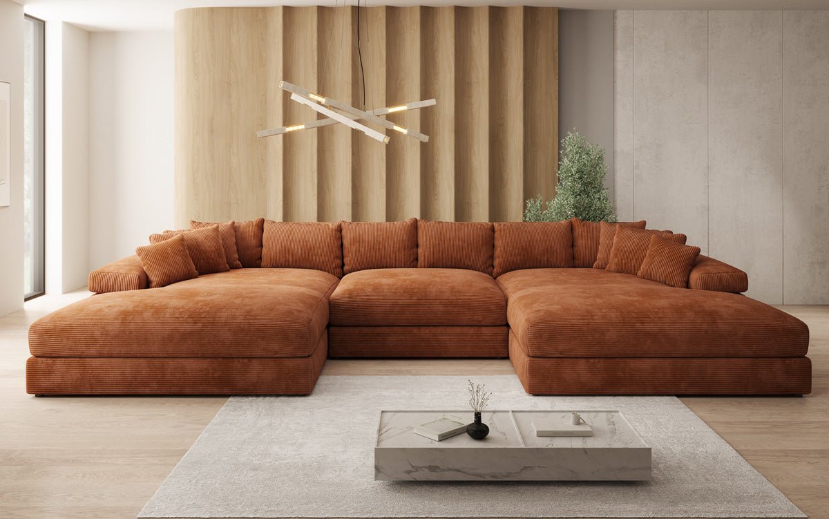 Designersofa Bernardo U met brede ottomane in ribstof