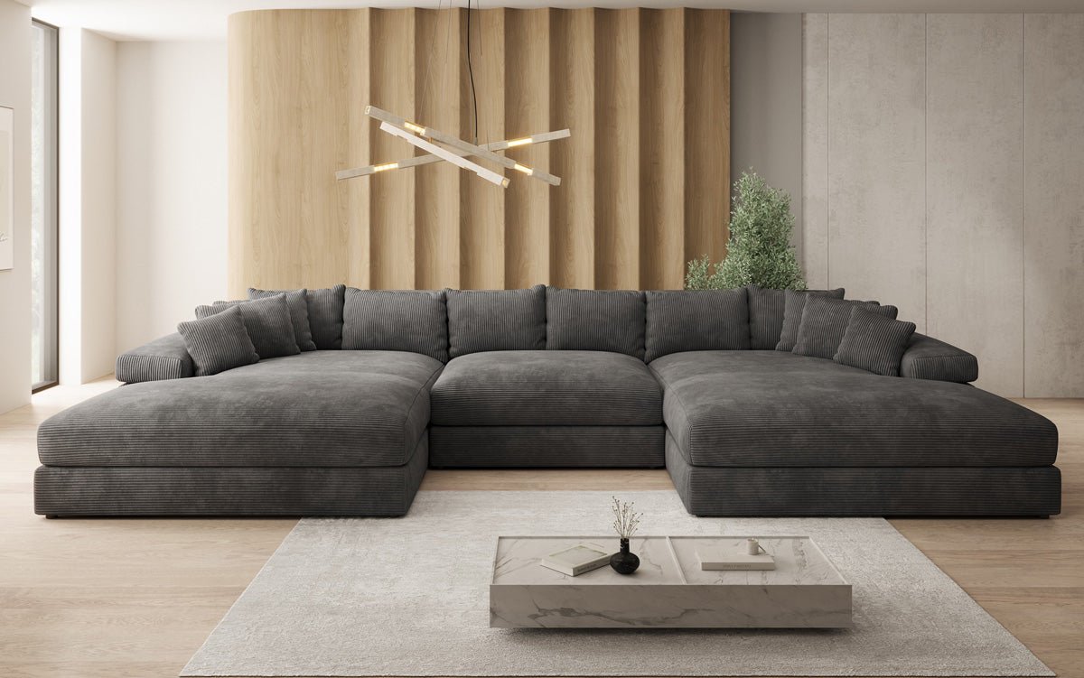 Designersofa Bernardo U met brede ottomane in ribstof