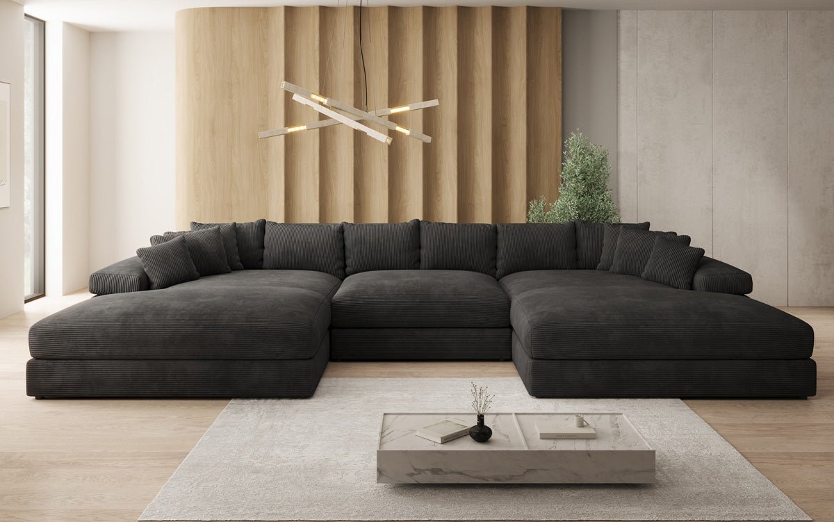 Designersofa Bernardo U met brede ottomane in ribstof