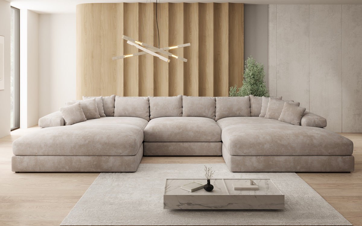 Designersofa Bernardo U met brede ottomane in ribstof
