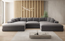 Designsofa Bernardo U met brede ottomane in structuurstof