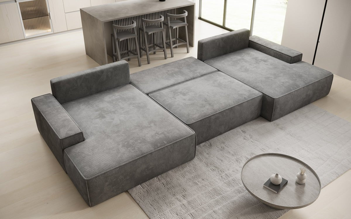 Designsofa Verona U met brede ottomane, slaapfunctie en opbergruimte in Ribstof
