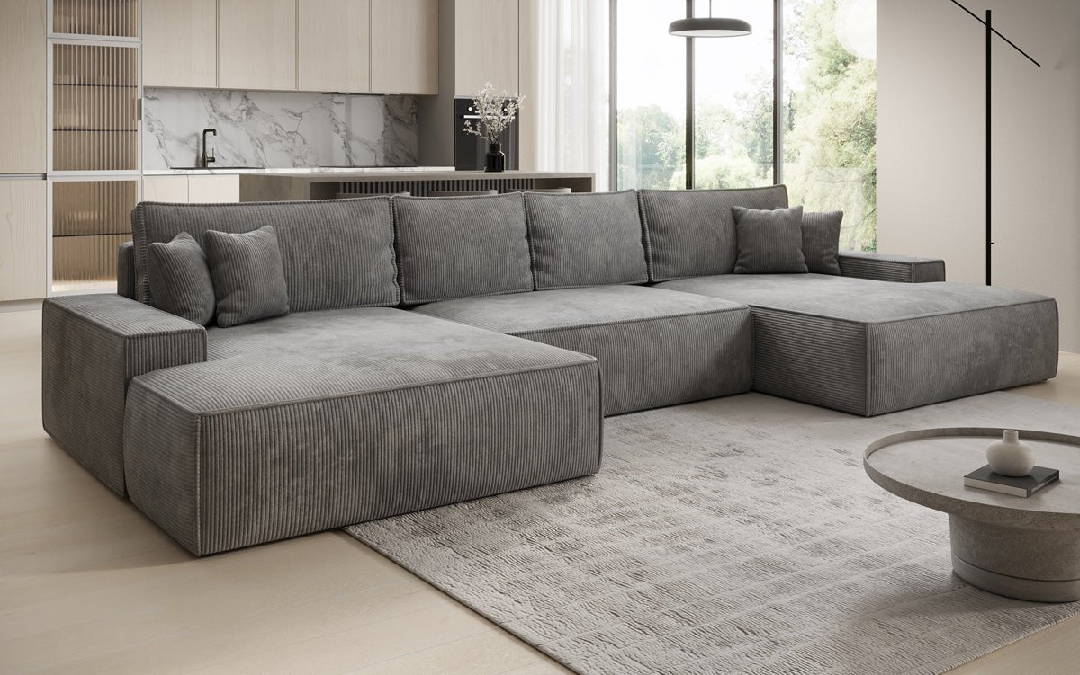 Designsofa Verona U met brede ottomane, slaapfunctie en opbergruimte in Ribstof