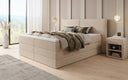 Boxspringbett Ophelia mit hochklappbarem Stauraum in Teddy Bouclé