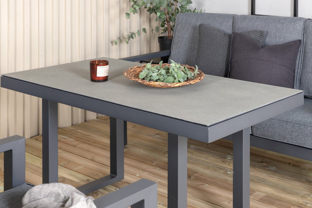 Garten Loungeset Kreta – 4-teiliges Set mit Tisch & dunkelgrauen Kissen