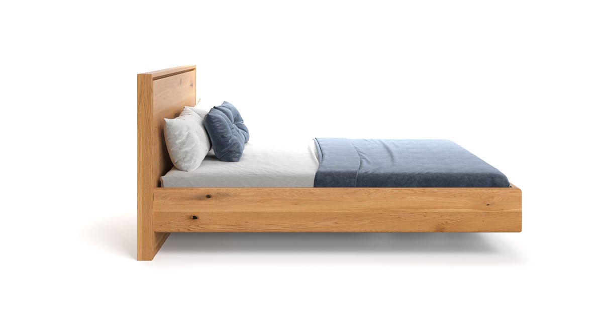 Designer wooden bed Celestia made of solid oak in a floating appearance